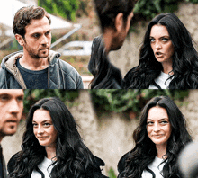 a man and a woman are looking at each other