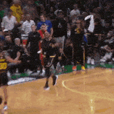 a basketball player with the number 30 on the back of his jersey