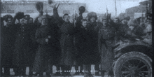 a black and white photo of soldiers with the words new warriors will rise on the bottom