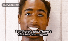 a close up of a man 's face with the words `` but there 's not . there 's classes on . ''