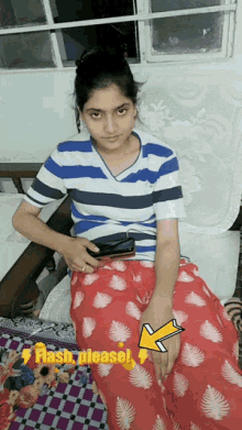a girl in a striped shirt sits on a bed with the words flash please written on the bottom