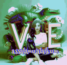 a woman is sitting in front of a crocodile and the letters ve