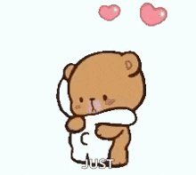 a cartoon teddy bear is hugging a pillow with hearts coming out of his head .