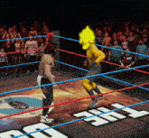 a wrestler in a ring with the word jrc on the ground
