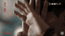 a person covering their face with their hands with aisplay written in the corner