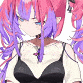 a girl with pink and purple hair is wearing a black top