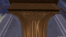 a screenshot of a video game shows a pillar with a swirl on it