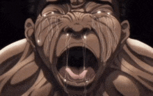 a close up of a man 's face with his mouth open and tears running down his face .