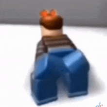 a blurry picture of a person 's butt with a crown on their head .