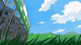 a blue sky with white clouds and a green building in the background