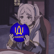 a cartoon girl is holding a blue ball with the letter ii on it