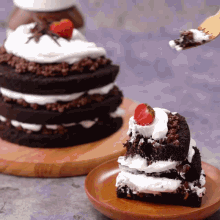 a slice of cake with a strawberry on top