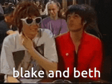 a couple of people sitting next to each other with blake and beth written on the bottom