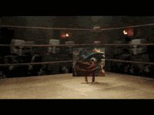 a cartoon character is in a boxing ring surrounded by skeletons