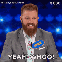 a man with a beard and a name tag that says brock on it