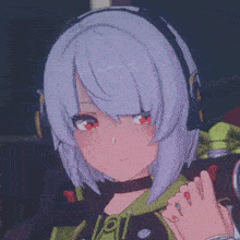 a close up of a girl with headphones and a choker with the letter a on it