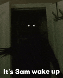 a dark room with the words " it 's 3am wake up "