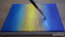 a painting is being painted on a canvas made in animatica