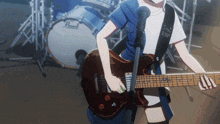 a girl is playing a guitar in front of a pearl drum set