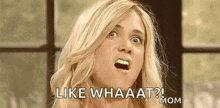 a woman is making a funny face and saying `` like whaaat ? ''