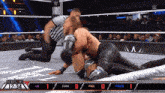 a wrestling match between lee evans and page is being shown