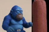 a blue gorilla wearing boxing gloves and a belt that says ron