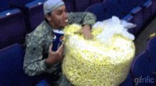 Popcorn Eating Popcorn GIF