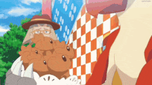 a man in a hat is holding a bunch of cupcakes on a plate .