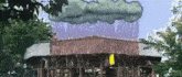 a drawing of a building with a cloud in the sky