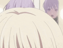 a girl with purple hair is looking at herself in the mirror .