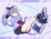 a girl with a cat on her head is laying on the floor