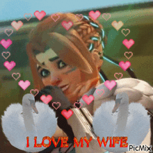 a picture of a woman surrounded by hearts and swans with the words i love my wife