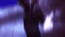 a person 's hand is visible in a blurry photo with a purple background and the words psychic moons