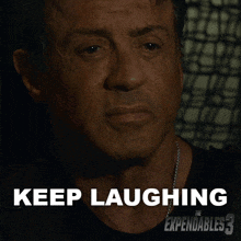 Keep Laughing Barney Ross GIF - Keep Laughing Barney Ross Sylvester Stallone GIFs