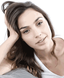 gal gadot is smile and pensative