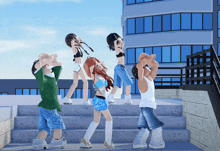 a group of anime characters are standing on a set of stairs in front of a building