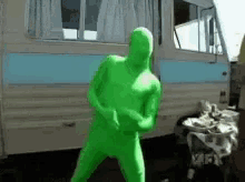 green dude dancing