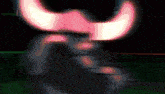 a close up of a person 's face with a pink horn on it