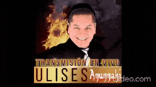 a man is smiling in front of a sign that says transmision en vivo ulises anunnaki