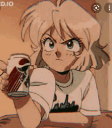 a girl is sitting at a table holding a can of pepsi .