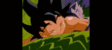 a close up of a cartoon character with a dragon ball on his chest .