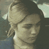 a close up of a woman 's face with the name crilianovna written on the bottom