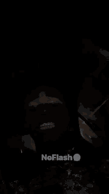 a black background with a smiley face and the words noflash below it