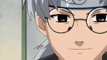 a close up of a person 's face with glasses and a headband