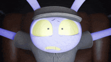 a purple cartoon character with yellow eyes and a hat on