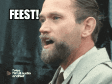 a man with a beard has the word feest written on his face