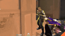 a video game screen shows a man holding a purple gun with the number 23 on it