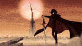 a man in a cape is holding a sword in front of a tower in the background .
