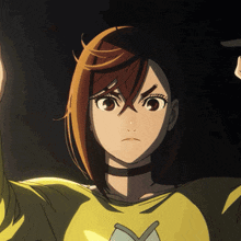 a girl in a yellow shirt with a heart on it