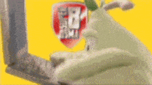 a blurred image of a cartoon character with a shield that says eb